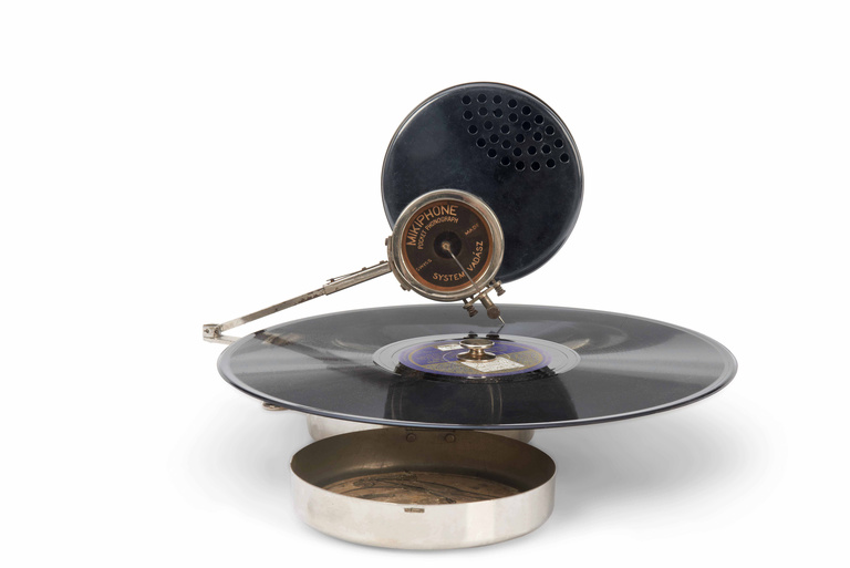 Editions Textuel -  9 - Mikiphone Pocket Phonograph playing record.jpg