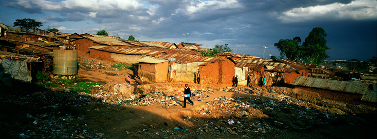 Editions Textuel -  TPWL PR Image - Nairobi (boy walking in field).jpg